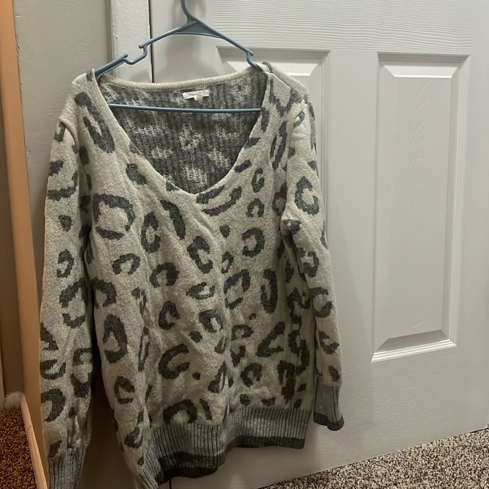 Maurice’s size large leopard print gray and white/cream sweater.
